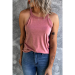 Woman wearing a White Solid Color Crew Neck Tank Top with jeans and a pink tank top