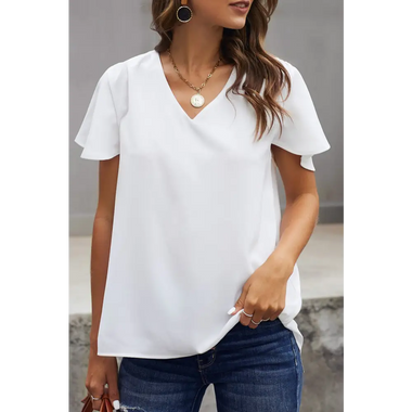 White V-neck blouse with flutter sleeves and blue jeans in sizes bust waist relax relax