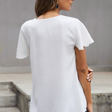 White flutter sleeve v-neck blouse with curved hemline for relaxed styles in all sizes