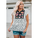 Floral embroidered leopard print blouse with distressed denim shorts, perfect for relaxed wear